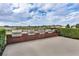 Five built-in grills with a scenic lake view at 4432 Waterford Dr, Lake Wales, FL 33859