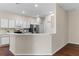 Modern kitchen with stainless steel appliances and a breakfast bar at 4432 Waterford Dr, Lake Wales, FL 33859