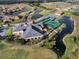 Large community building near golf course and lake at 4432 Waterford Dr, Lake Wales, FL 33859