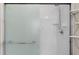 Clean bathroom with a walk-in shower and tiled walls at 4432 Waterford Dr, Lake Wales, FL 33859