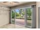 Sunroom with sliding doors leading to a screened patio at 4432 Waterford Dr, Lake Wales, FL 33859