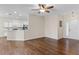 Living room with hardwood floors, kitchen bar and view to the entryway at 4432 Waterford Dr, Lake Wales, FL 33859