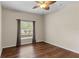 Well-lit bedroom with wood flooring and ceiling fan at 4432 Waterford Dr, Lake Wales, FL 33859