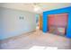 Bedroom with a large closet and view into another room at 11 Tamiami Way, Kissimmee, FL 34758