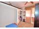 Well-organized bedroom closet with shelving and hanging space at 820 Avenue Z Nw, Winter Haven, FL 33881