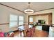 Casual dining area with hardwood floors and view to the living room at 820 Avenue Z Nw, Winter Haven, FL 33881