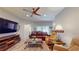 Relaxing living room with comfortable seating and large TV at 1067 Snively Cir, Lake Hamilton, FL 33851
