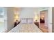 Bright bedroom with two nightstands and a view at 1067 Snively Cir, Lake Hamilton, FL 33851