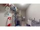 Laundry room with washer, dryer, and shelving at 1067 Snively Cir, Lake Hamilton, FL 33851