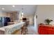Open kitchen with breakfast bar and view into living area at 1067 Snively Cir, Lake Hamilton, FL 33851