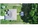 Aerial view of a house, yard, and surrounding trees at 1067 Snively Cir, Lake Hamilton, FL 33851