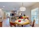 Bright kitchen features breakfast nook and modern appliances at 1067 Snively Cir, Lake Hamilton, FL 33851