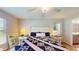 Bright bedroom with a queen-size bed and ensuite bathroom at 1067 Snively Cir, Lake Hamilton, FL 33851