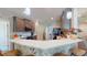 Modern kitchen with stainless steel appliances and white quartz countertops at 1067 Snively Cir, Lake Hamilton, FL 33851