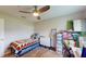 Multi-purpose bedroom with sewing station and bed at 1067 Snively Cir, Lake Hamilton, FL 33851