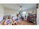 Cozy bedroom with a sewing station and window at 1067 Snively Cir, Lake Hamilton, FL 33851