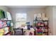 Well-equipped craft room with sewing machine and storage at 1067 Snively Cir, Lake Hamilton, FL 33851