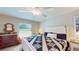 Spacious bedroom with a queen-size bed and ensuite bathroom at 1067 Snively Cir, Lake Hamilton, FL 33851