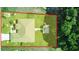 Bird's eye view of a single story house, large backyard, and surrounding trees at 1067 Snively Cir, Lake Hamilton, FL 33851