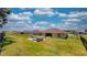 Spacious backyard with a patio and grill area at 1067 Snively Cir, Lake Hamilton, FL 33851