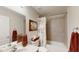 Bathroom with tub, shower, and updated vanity at 1067 Snively Cir, Lake Hamilton, FL 33851