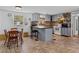 Galley-style kitchen with light-grey cabinets and wood countertops at 14813 Camp Mack Rd, Lake Wales, FL 33898