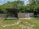 Tan and white storage sheds with parking at 14813 Camp Mack Rd, Lake Wales, FL 33898