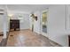 Bright living room with tile floors and access to a patio at 14813 Camp Mack Rd, Lake Wales, FL 33898