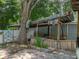 Rustic wooden pergola with a birdhouse at 14813 Camp Mack Rd, Lake Wales, FL 33898