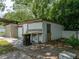 Detached workshop with corrugated metal siding at 14813 Camp Mack Rd, Lake Wales, FL 33898