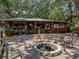 Camp Mack outfitter shop with fire pit and seating area at 14813 Camp Mack Rd, Lake Wales, FL 33898