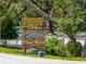 Camp Mack sign welcomes visitors, listing available activities and amenities at 14813 Camp Mack Rd, Lake Wales, FL 33898