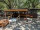 Small snack bar with license plates and tiki roof at 14813 Camp Mack Rd, Lake Wales, FL 33898
