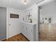 Charming hallway with built-in storage and view into another room at 14813 Camp Mack Rd, Lake Wales, FL 33898