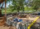 Community patio with picnic tables and benches at 14813 Camp Mack Rd, Lake Wales, FL 33898