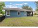 Single-story home with a screened porch and fenced-in backyard at 329 Lake Vista Dr, Auburndale, FL 33823