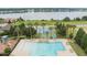 Resort-style pool with lounge chairs and lake views at 329 Lake Vista Dr, Auburndale, FL 33823
