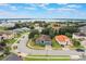 Aerial view of house and neighborhood, showcasing lake access at 329 Lake Vista Dr, Auburndale, FL 33823