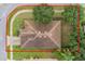 Aerial view showcasing the house and property lot at 329 Lake Vista Dr, Auburndale, FL 33823