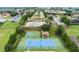 Community tennis and basketball courts at 329 Lake Vista Dr, Auburndale, FL 33823