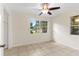 Spacious bedroom with tile flooring and ceiling fan at 1165 E Church St, Bartow, FL 33830