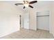 Well-lit bedroom with tile floors and ample closet space at 1165 E Church St, Bartow, FL 33830