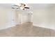 Open living room and dining area with tile flooring and neutral color palette at 1165 E Church St, Bartow, FL 33830