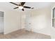 Charming bedroom with tile floors and access to another room at 1165 E Church St, Bartow, FL 33830