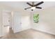 Spacious bedroom with tile floors and access to another room at 1165 E Church St, Bartow, FL 33830