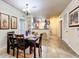 Open dining area with kitchen and living room views at 902 Charo Pkwy # 624, Davenport, FL 33897