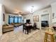 Open concept dining area with seating for four at 902 Charo Pkwy # 624, Davenport, FL 33897