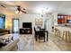 Spacious living room with ample natural light and a TV at 902 Charo Pkwy # 624, Davenport, FL 33897