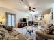 Comfortable living room features a neutral color palette at 902 Charo Pkwy # 624, Davenport, FL 33897