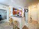 Modern kitchen with breakfast bar and granite countertops at 902 Charo Pkwy # 624, Davenport, FL 33897
